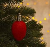 Украшение новогоднее световое Шишка на елку 6см красный